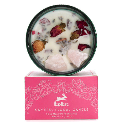 Crystal floral candle with rose petals and stones on a pink box labeled 'Tophare'.